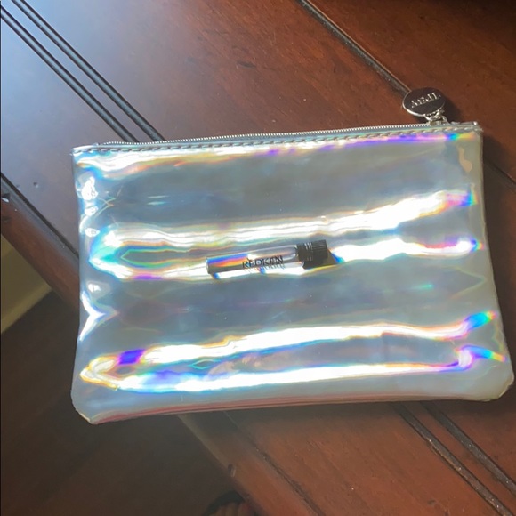 ipsy Handbags - Ipsy holographic makeup bag with redken oil
